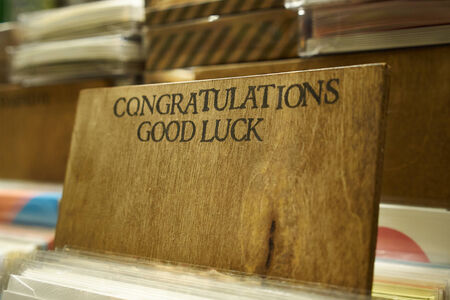 wooden divider for greetting, gift, wedding cards in a boston shop