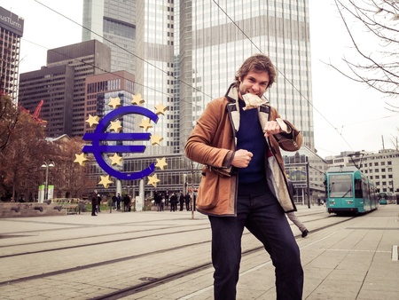 Man with banknotes in Frankfurtの素材