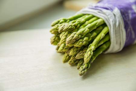 Asparagus packed in natural fabricの写真素材