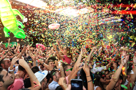 Dancing crowd at after hour Party Club Elrow Barcelonaのeditorial素材