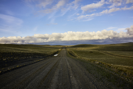 Rural road in Argentinan Patagonia. Vanishing point. Horizon line.の写真素材