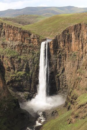 close-up of stunning waterfall running down a steap canyonの写真素材