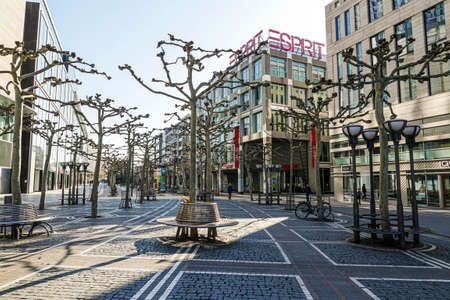 Coronavirus lockdown. Frankfurt, Germany. April 5, 2020. Zeil promenade and shopping zone with empty benches during covid-19 lockdown.のeditorial素材