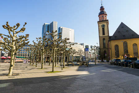 Coronavirus lockdown. Frankfurt, Germany. April 5, 2020. Empty promenade with St. Paul's church and modern buildings druid covid-19 quarantine.のeditorial素材