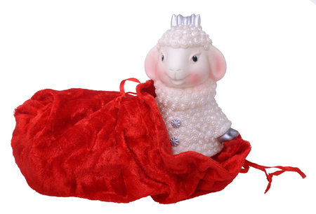 small white goat in the gift bagの写真素材