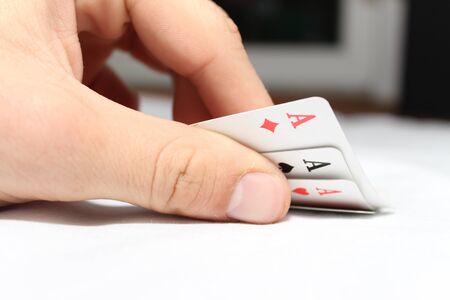 Four Poker card of ace in handの写真素材