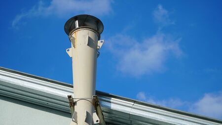 Fan on the roof of the building. Exhaust ventilation on the roof carries a cool wind into the building. nの写真素材