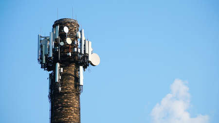 Technology on the top of the telecommunication GSM 5G, 4G, 3G tower.Cellular phone antennas on a...