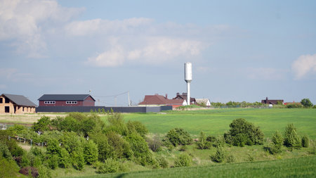 Irrigation plant for watering green crops. modern irrigation system. Circular irrigation fields. Concept: agriculture or water supply. nの写真素材