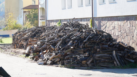 Stock of firewood for heating the house. global crisis and price rise. Heating home with firewoodの写真素材