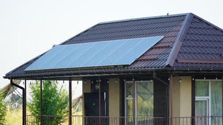 Solar panels on the roof of the house. solar energy generation. nの写真素材