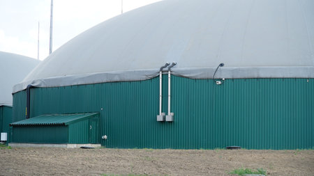 Biogas. Modern bio comlex. Renewable energy from biomass. Innovative biogas plant among green nature.の写真素材
