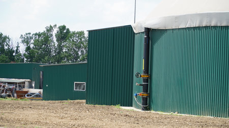 Biogas. Modern bio comlex. Renewable energy from biomass. Innovative biogas plant among green nature.の写真素材