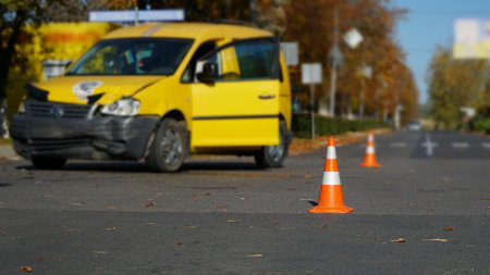 Traffic accident. Wrecked car. Car crash accident on street, damaged automobiles after collision in city. nの写真素材