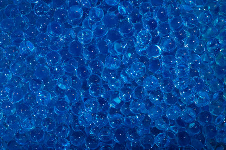 blue round sparkling water granules, backgroundの写真素材