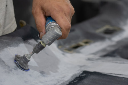 car repair, tool in hand, working process.の写真素材