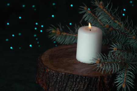 candle flame on a dark background. Christmas decoration.の写真素材