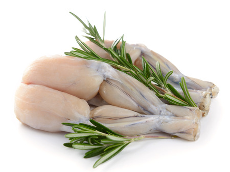 Two Pairs of Fresh Frog Legs isolated on white backgroundの写真素材