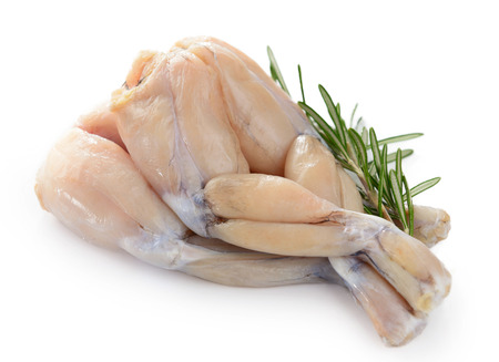 Two Pairs of Fresh Frog Legs isolated on white backgroundの写真素材