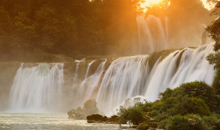 Detian Waterfall at sunset in Guangxi, Chinaの写真素材