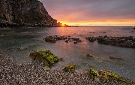 Gueirua beach at sunset. A beautiful beach Asturias, Spain.の写真素材