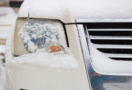 Headlamp winter in the snow in the daytimeの写真素材