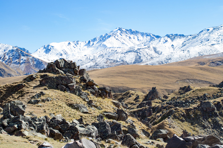 Landscape panorama caucasus mountain with autumn hills daytimeの写真素材