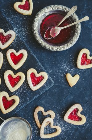 Heart shaped Linzer cookies with jam for Valentine's day.の写真素材
