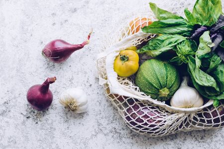 Zero waste concept. Package-free food shopping. Eco friendly natural bag with organic fruits and...