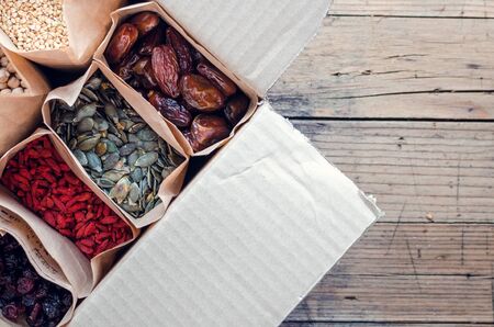 Zero waste delivery concept. Eco-friendly packing. Paper bags with organic food, zero waste...