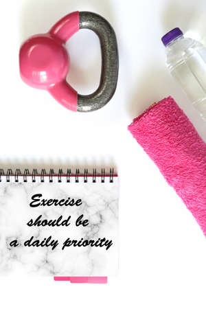 Fitness motivational quote. Healthy lifestyle, fitness, sport, athletes equipment in pink colour on...