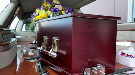 closeup shot of a colorful casket in a hearse before funeralのeditorial素材