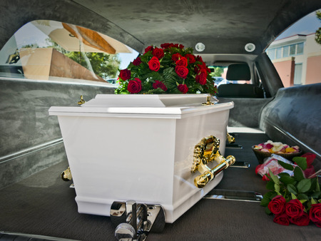closeup shot of a colorful casket in a hearse before funeralのeditorial素材