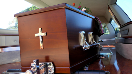 closeup shot of a colorful casket in a hearse before funeralのeditorial素材