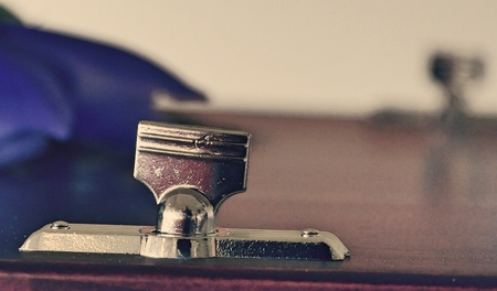 Closeup shot of a colorful casket in a hearse or chapel before funeral or burial at cemeteryの写真素材