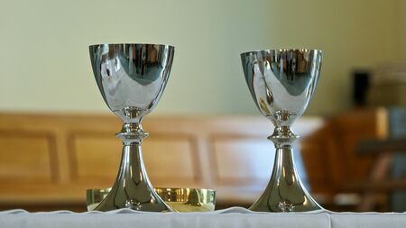 shot of religious christian or catholic chapel and altar for worshippersの写真素材