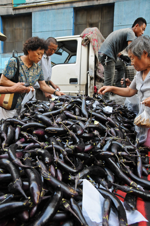 Harbin, China, 1st of Nov 2019,  hawkers and peddlers selling food and grocery in walking streetのeditorial素材