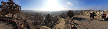 Goreme valley with ancient chapels carved into hillside, Cappadocia, Turkey