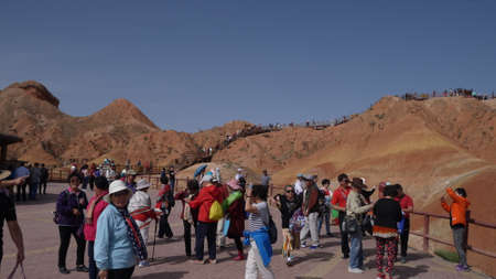 ZhangYe, China, 1st of Jan 2020, tourists visiting the ZhangYe Rainbow Mountain, Danxia,  a unique type of petrographic geomorphology found in China.のeditorial素材