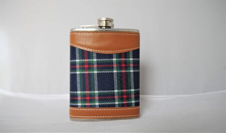 Stainless steel hip flask for portable consumption of alcoholの写真素材