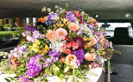 closeup of colorful casket in a hearse or chapel before funeral or burial at cemetery