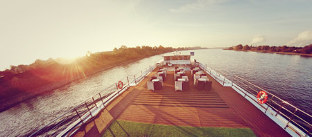 Cruise ship on the river. Panoramic view of the river.の写真素材