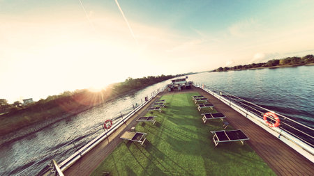 Sunset over the river. Panoramic view of the river.