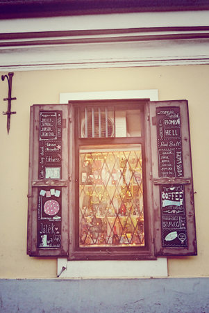 Vintage window of a cafe in the old town of Vilnius, Lithuaniaの写真素材