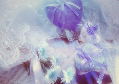 Wedding rings on the background of the bride's bouquetの写真素材