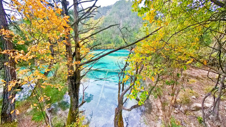 Turquoise color lake found in the nature reserve and national park of Chinaの写真素材