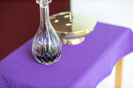 Item with bread and wine on a tableの写真素材