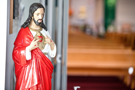 Holy Statue of worship of Jesus in a religious Christian or catholic chapelの写真素材