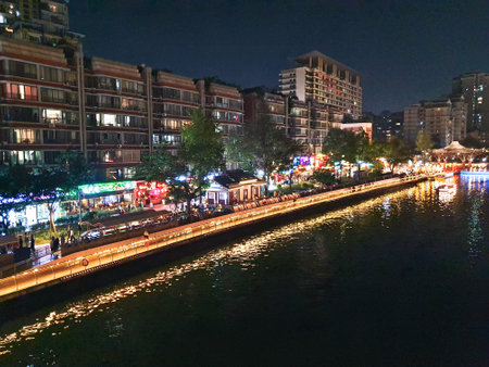 night shot of the Chengdu city along the Jin river from the top of Anshun bridge
