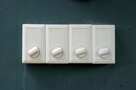 Adjustment switch on wall